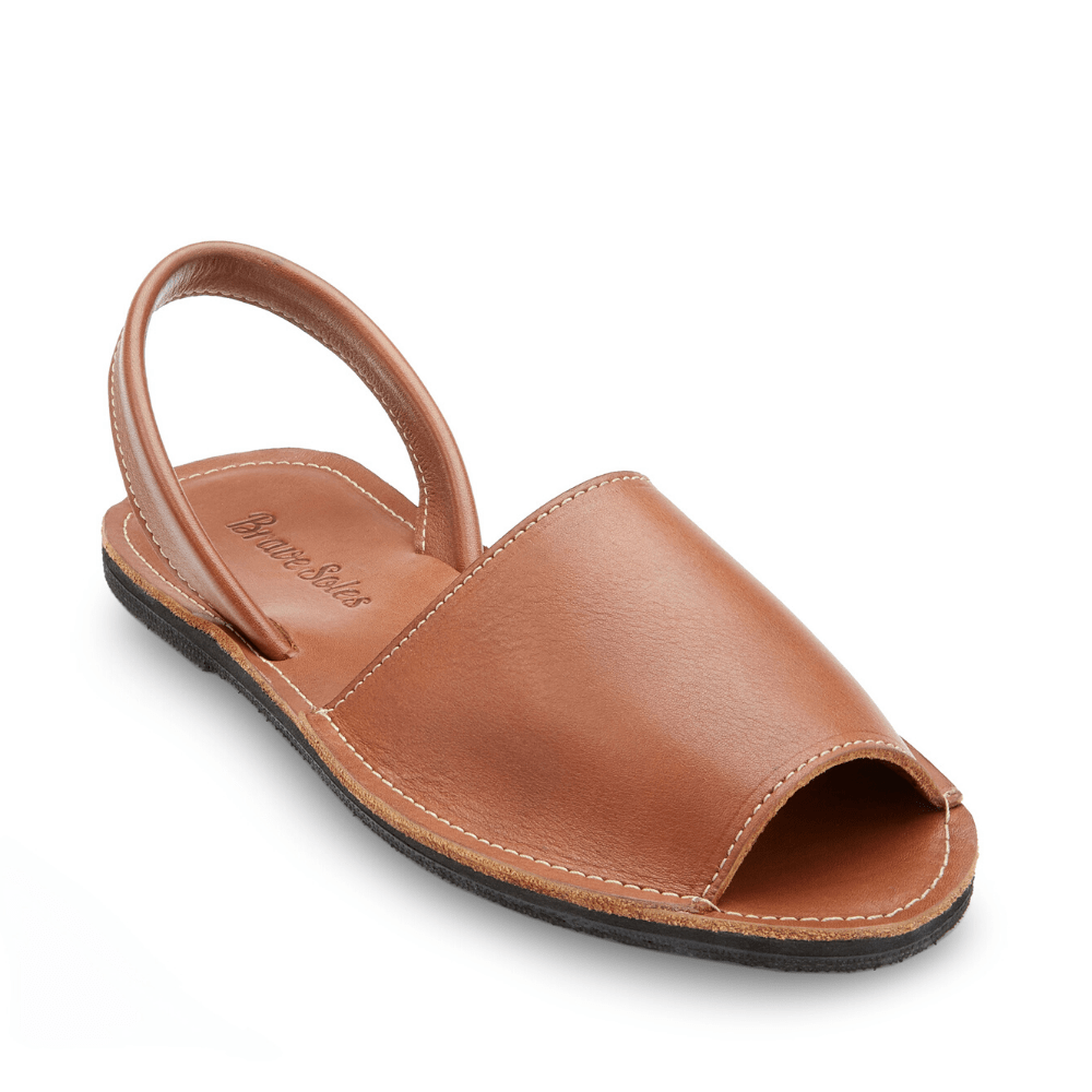 Front side view of the Avarca classic Spanish leather sandal sustainably made by Brave Soles in caramel color