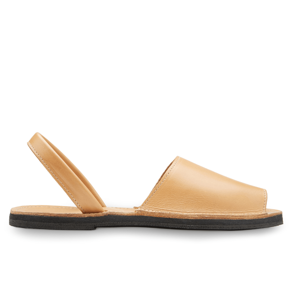 Lower side view of the Avarca classic Spanish leather sandal sustainably made by Brave Soles in natural color