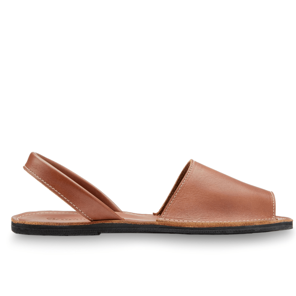Lower side view of the Avarca classic Spanish leather sandal sustainably made by Brave Soles in caramel color