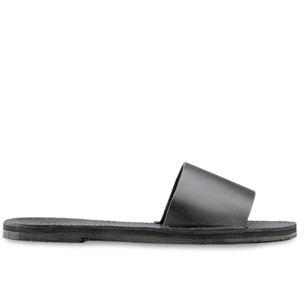 Lower side view of The Linda Women's Leather Slide Sandal in black color, sustainably made by Brave Soles.