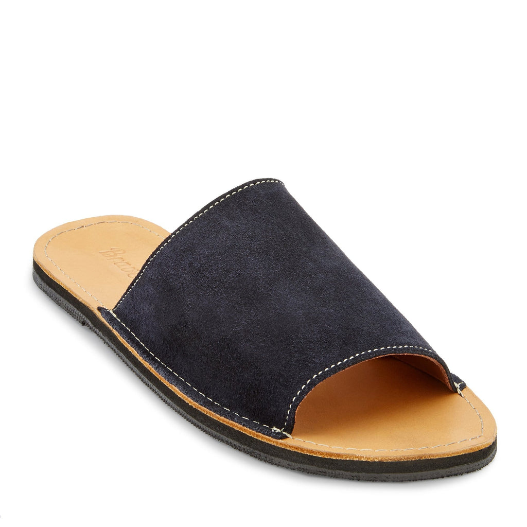Front side view of the Oceana sustainably made leather slide sandal from Brave Soles in Navy and light brown color.