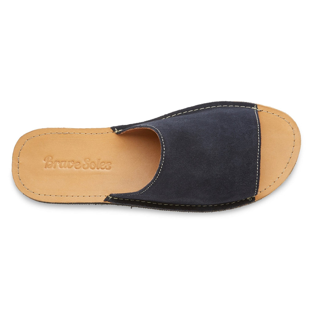 Top view of the Oceana sustainably made leather slide sandal from Brave Soles in Navy and light brown color.